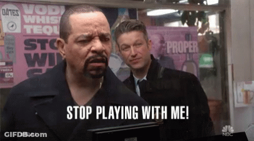 Man Saying Stop Playing With Me In Front Of Sign GIF