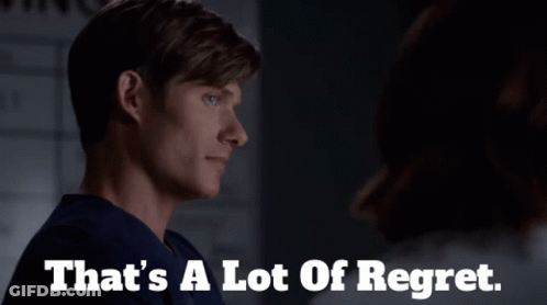 Man Saying That's A Lot Of Regret In Dark Room GIF