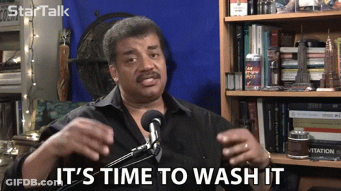 Man Saying Time To Wash It At Microphone GIF
