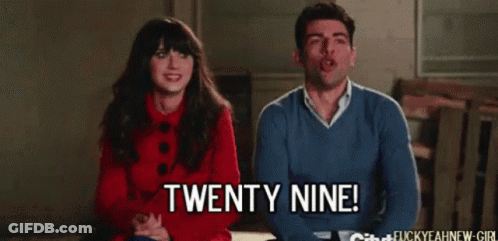 Man Saying Twenty Nine Next To Woman GIF