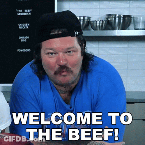 Man Saying Welcome To The Beef While Wearing Hat GIF