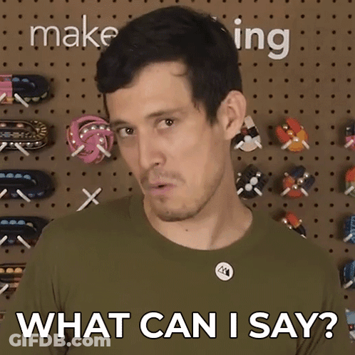 Man Saying What Can I Say In Wall Of Toys GIF