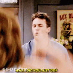 Man Saying What Did You Just Do In Front Of Poster GIF