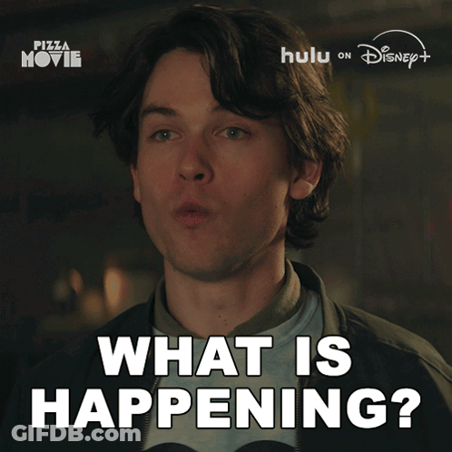 Man Saying What In Front Of Disney Logo GIF