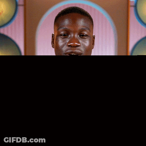 Man Saying What In White Letters GIF