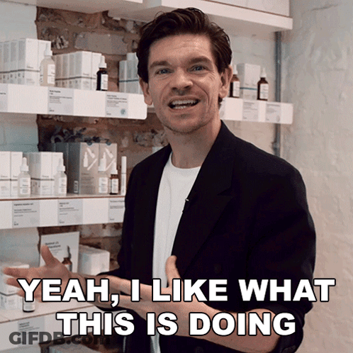 Man Saying Yeah In Front Of Bottles GIF