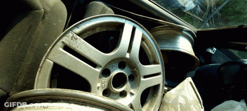 Man Says Back Down Onto Two Wheels GIF