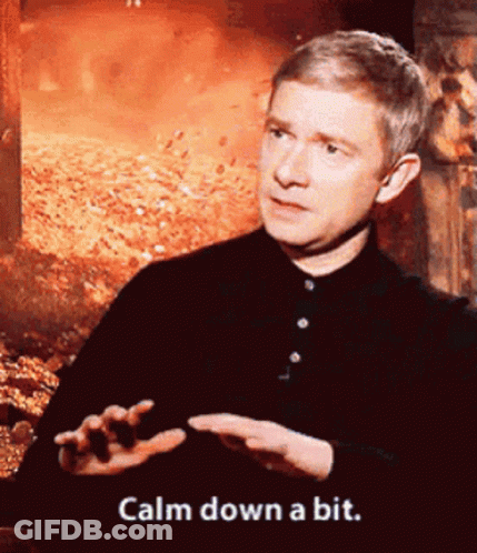 Man Says Calm Down A Bit In Front Of Pile Of Leaves GIF