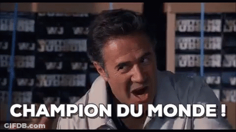Man Says Champion Du Monde Beside Shelf GIF