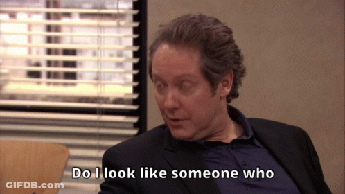 Man Says Do I Look Like Someone Who In Front Of Window GIF