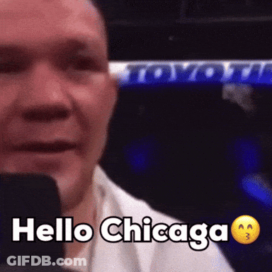 Man Says Hello Chicago In Front Of Toyota Banner GIF