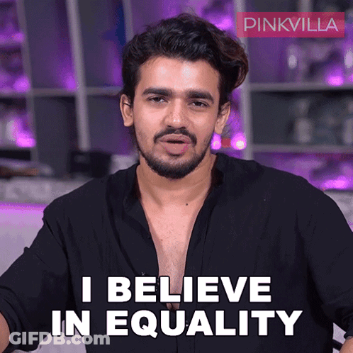 Man Says I Believe In Equality In Front Of Pinkvilla Banner GIF