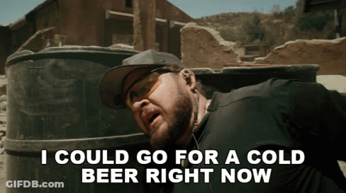Man Says I Could Go For A Cold Beer Right Now In Front Of Barrel GIF