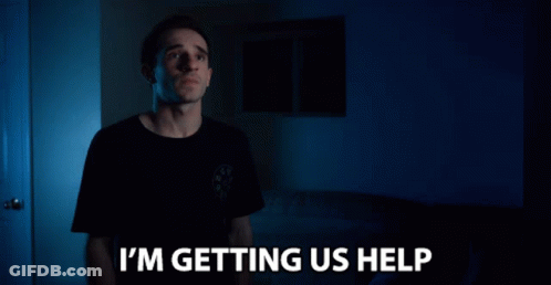 Man Says I'm Getting Us Help Dark Room GIF