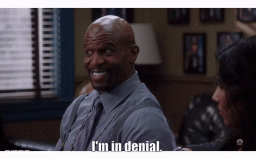 Man Says I'm In Denial In Front Of Window GIF