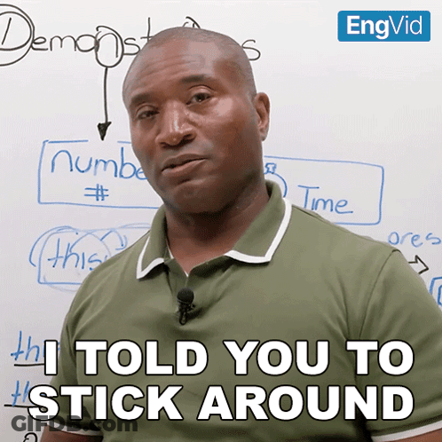 Man Says I Told You To Stick Around In Front Of Whiteboard GIF