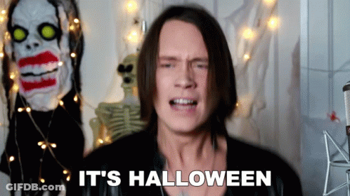 Man Says It's Halloween In Front Of Skeleton GIF