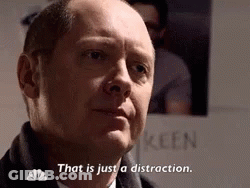 Man Says That Is Just A Distraction In Front Of Keen Sign GIF