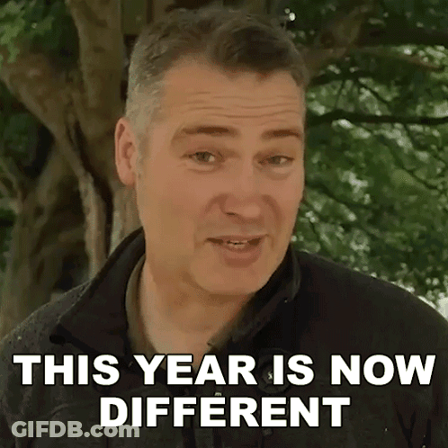 Man Says This Year Is Now Different In Front Of Trees GIF
