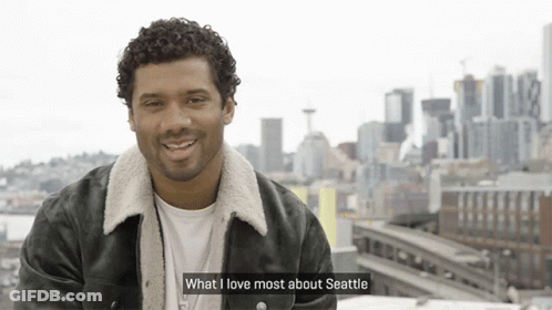 Man Says What I Love Most About Seattle In Front Of Skyline GIF