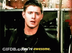 Man Says You're Awesome In Front Of Shelf GIF