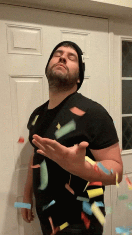 Man Scattered Confetti Celebration Meme GIF