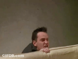 Man Screaming Holding Couch Saying Shut Up GIF