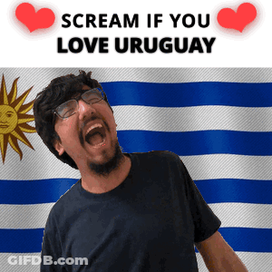 Man Screaming In Front Of Uruguay Flag GIF