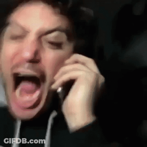 Man Screaming On Cell Phone GIF