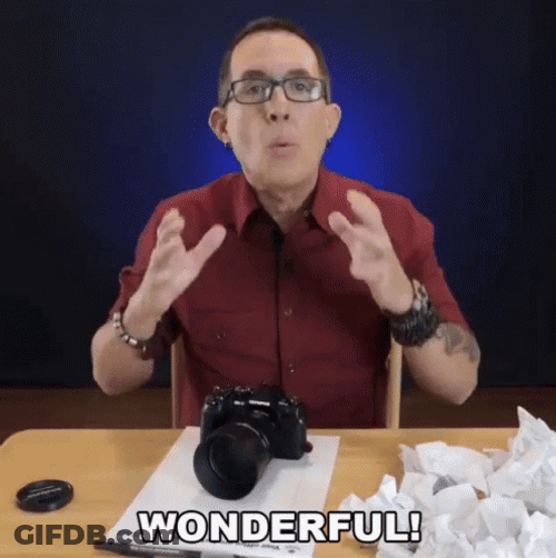 Man Seating Introducing Camera Wonderful GIF