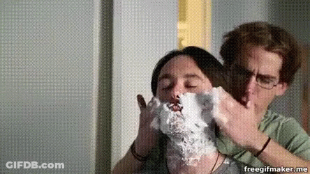 Man Shaving Another Man's Face With Shaving Cream GIF