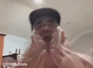 Man Shaving Face With Razor Wearing Hat GIF