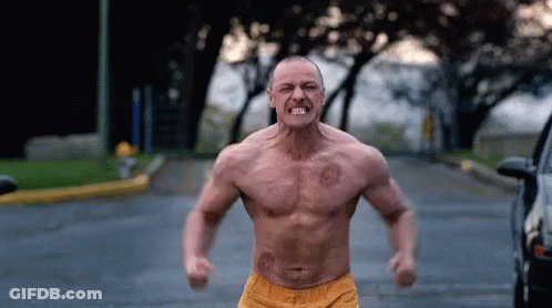 Man Shirtless Fists In Air GIF
