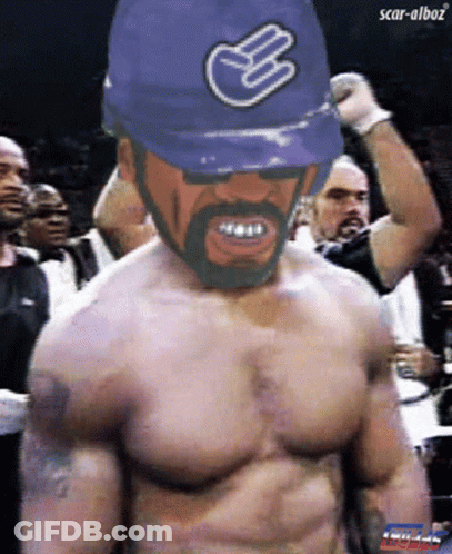 Man Shirtless Wearing Blue Hat With Hand Symbol GIF