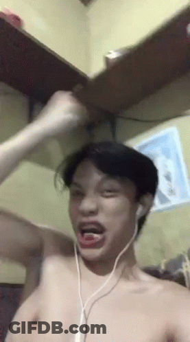 Man Shirtless Wearing Headphones Making Funny Face GIF