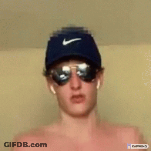 Man Shirtless Wearing Nike Hat And Sunglasses Making Funny Face GIF