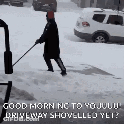 Man Shoveling Snow On Driveway GIF