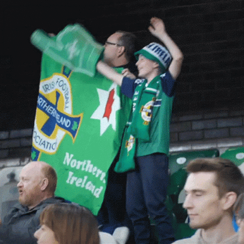 Man Showing Flag Of Northern Ireland Football Team GIF