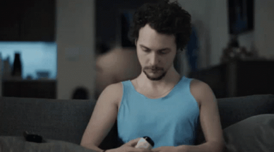 Man Showing Muscle Growth With Friends GIF