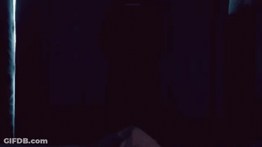 Man Shrugging After Opening Curtain GIF