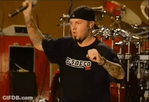 Man Singing Into Mic In DS Side Co T-Shirt GIF