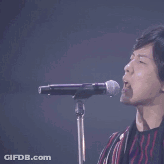 Man Singing Into Microphone GIF