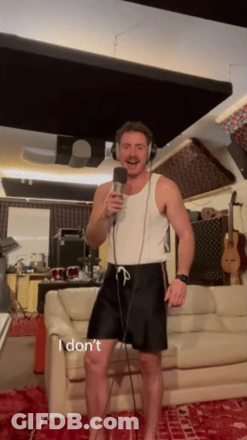 Man Singing Into Microphone GIF