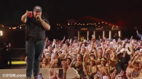 Man Singing Into Microphone GIF