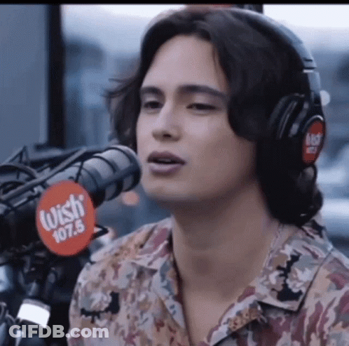 Man Singing Into Microphone GIF
