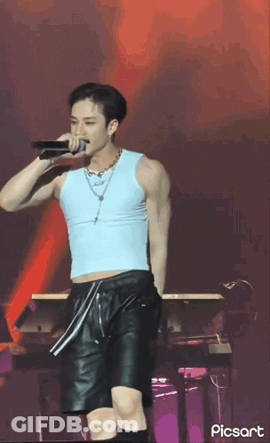 Man Singing Into Microphone GIF
