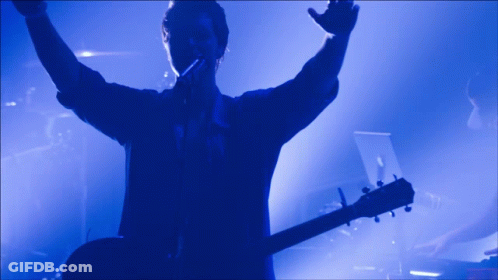 Man Singing Into Microphone GIF
