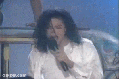 Man Singing Into Microphone GIF