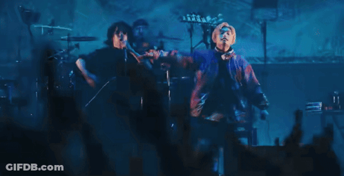 Man Singing Into Microphone GIF