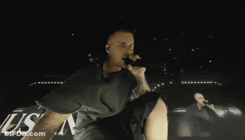 Man Singing Into Microphone GIF